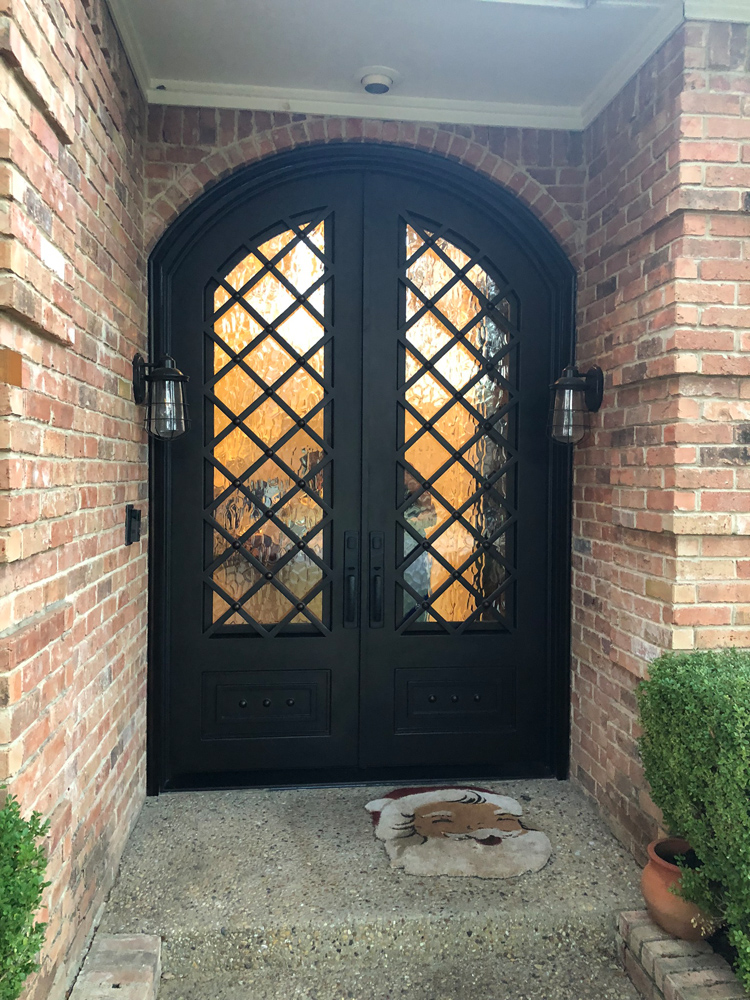 Arched Double Iron Door with X Pattern