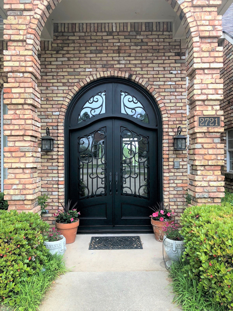 Arched Double Iron Doors with Arched Transom