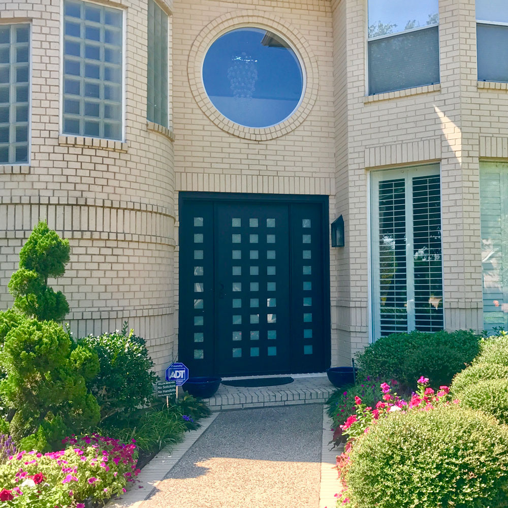 Modern Multi Lite Iron Door with Matching Sidelites