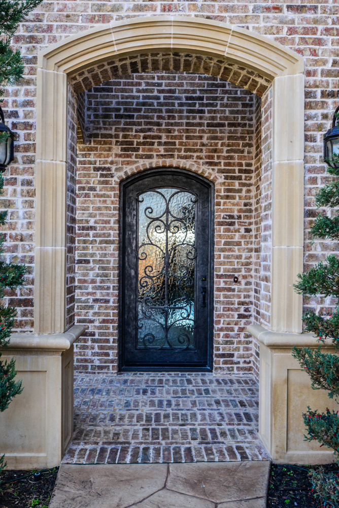 Arched Traditional Iron Door with Scrollwork